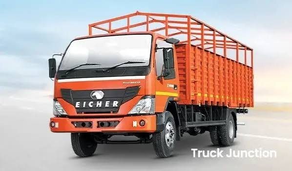 An orange 19 FT Eicher canter truck